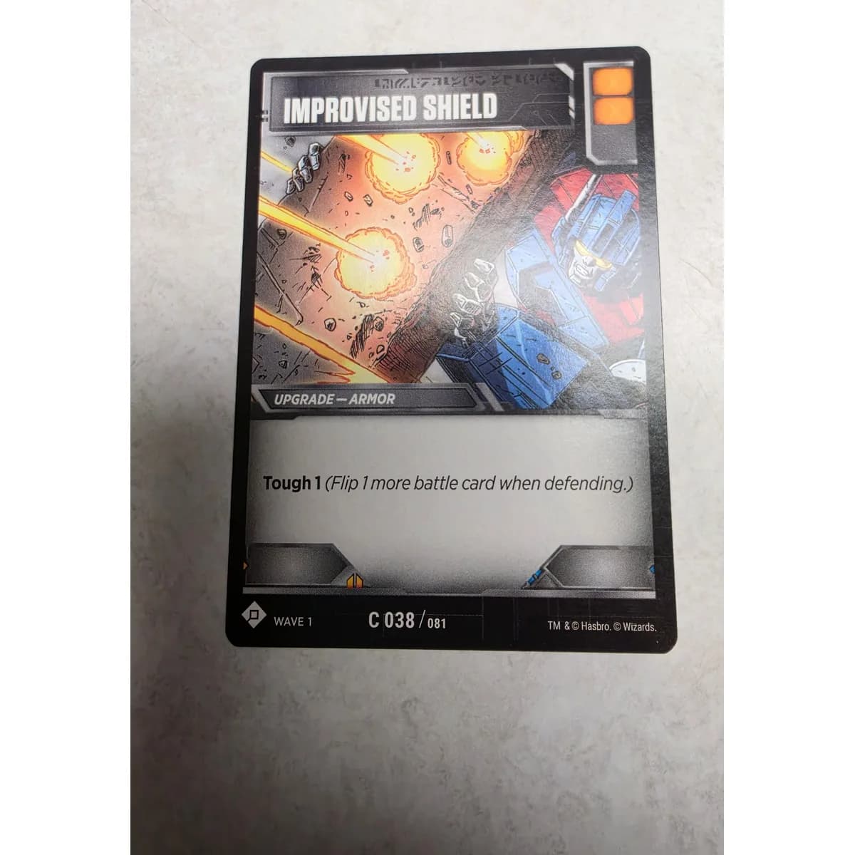 Improvised Shield 038/081 - Transformers TCG Wave 1