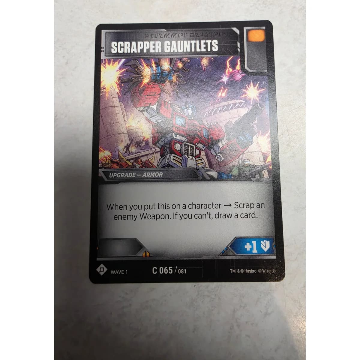 Scrapper Gauntlets 065/081 - Transformers TCG Wave 1